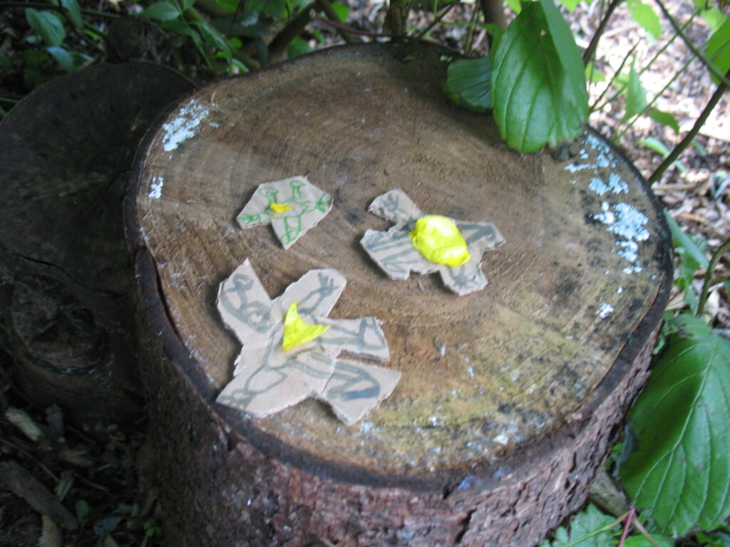 three imps playing chequers